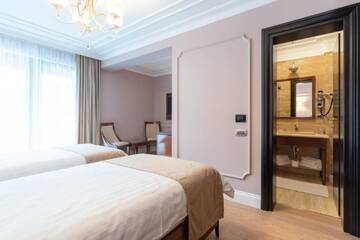 Фото номера Двухместный номер с 2 отдельными кроватями Отель Hotel Gabriela г. Вишеу-де-Сус 3